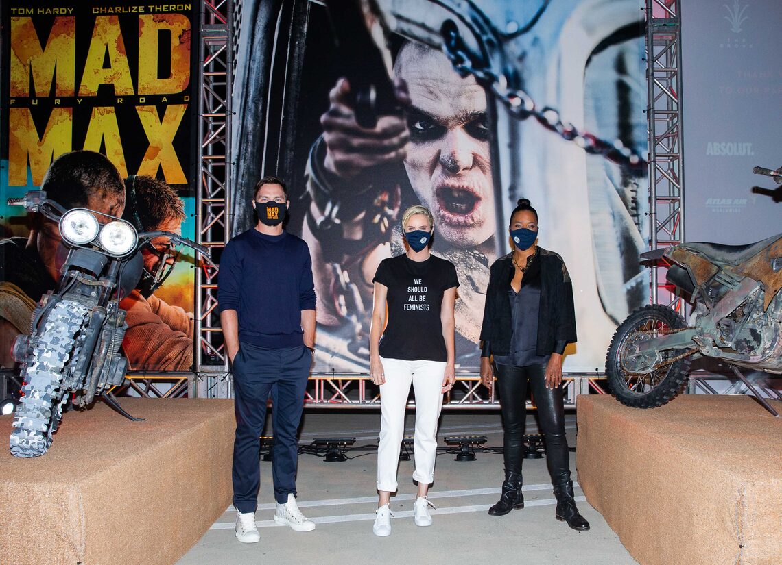 Nicholas Hoult, Charlize Theron and Aisha Tyler posed at special drive-in screening of “Mad Max: Fury Road” at The Grove to benefit the Charlize Theron Africa Outreach Project (CTAOP). At the screening, Nicholas enjoyed an alcohol-free Heineken® 0.0.