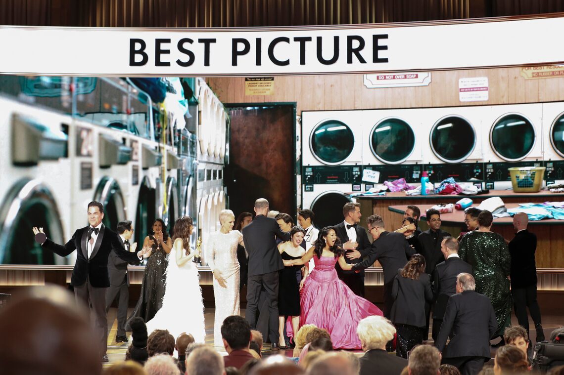Jonathan Wang accepts the Best Picture award for "Everything Everywhere All at Once" along with cast and crew onstage during the 95th Annual Academy.