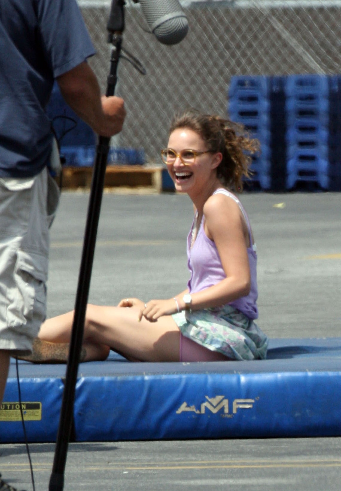 A bespectacled Natalie Portman takes a set break after performing stunts for her new film "Hesher" in Los Angeles.