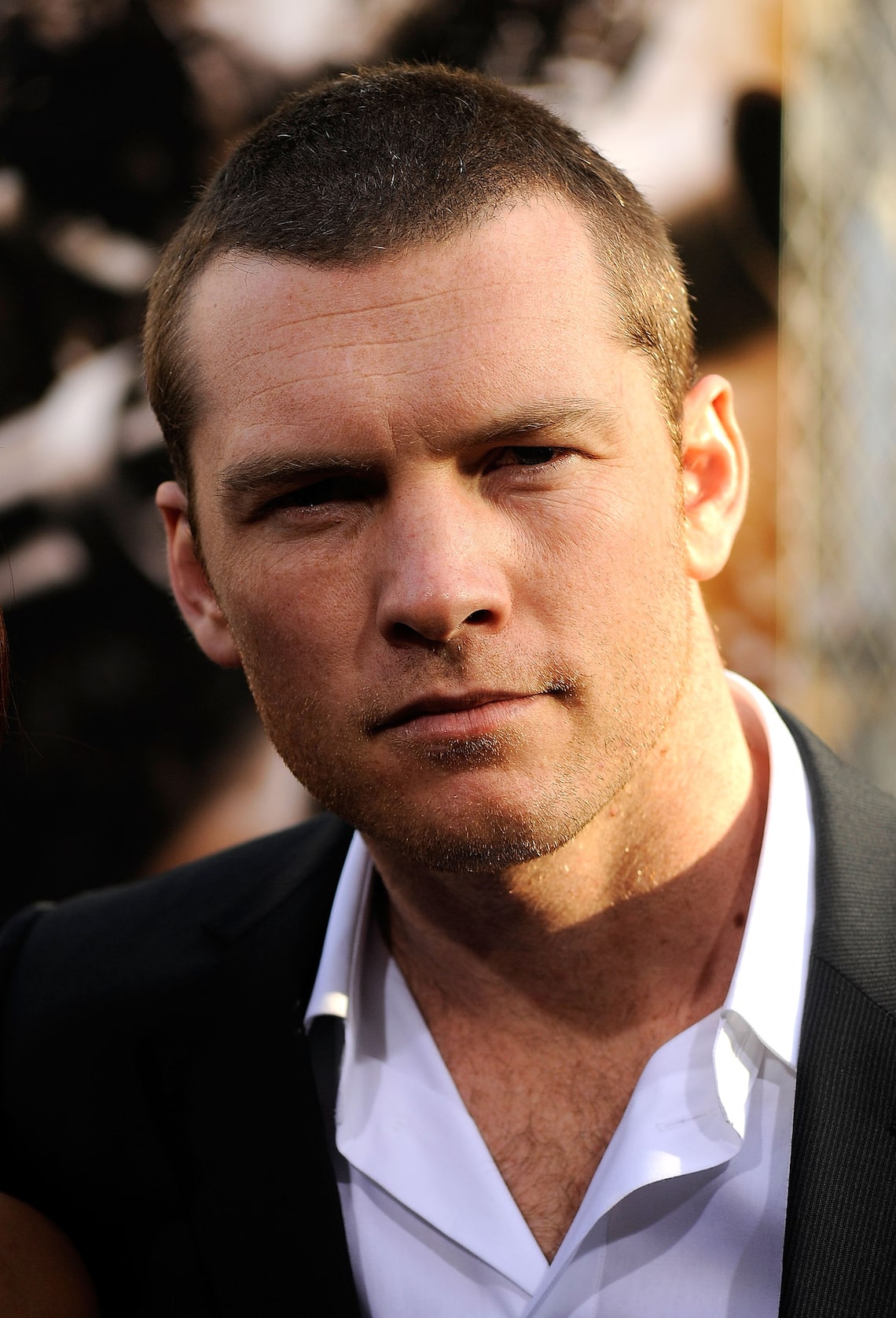 Smoking hot Sam Worthington shows off a modelesque pose on the red carpet for his new flick "Terminator Salvation."