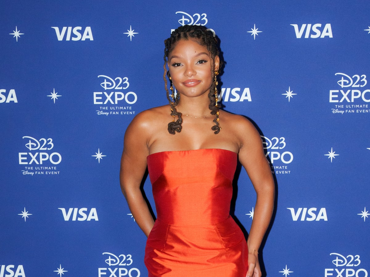 halle bailey red dress Halle Bailey wears a bold red, floor-length dress at the Pre-Grammys from @newarrivals.co The halter-neck dress fits close to the body, with soft ruching at the waist and small cut-out details on
