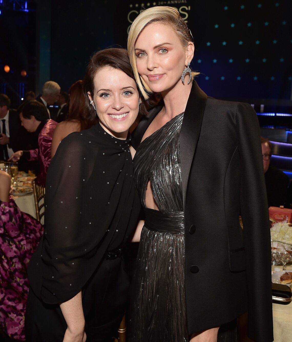 Claire Foy and Charlize Theron caught up inside the show.