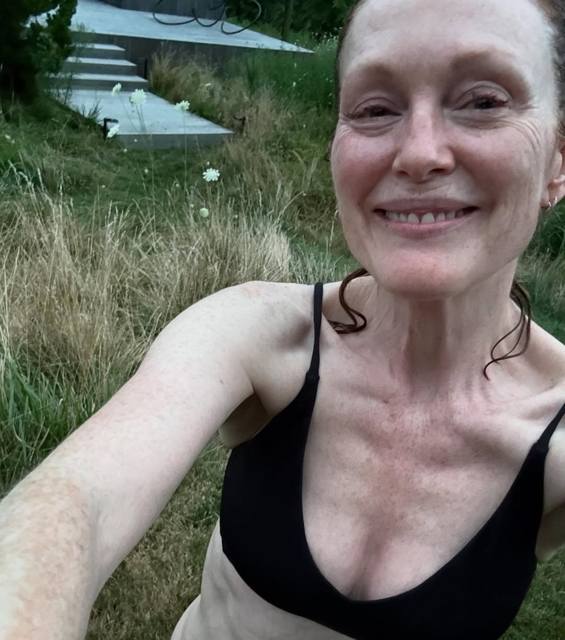 Julianne Moore, 64, smiled wide for a makeup free bikini selfie on Instagram.