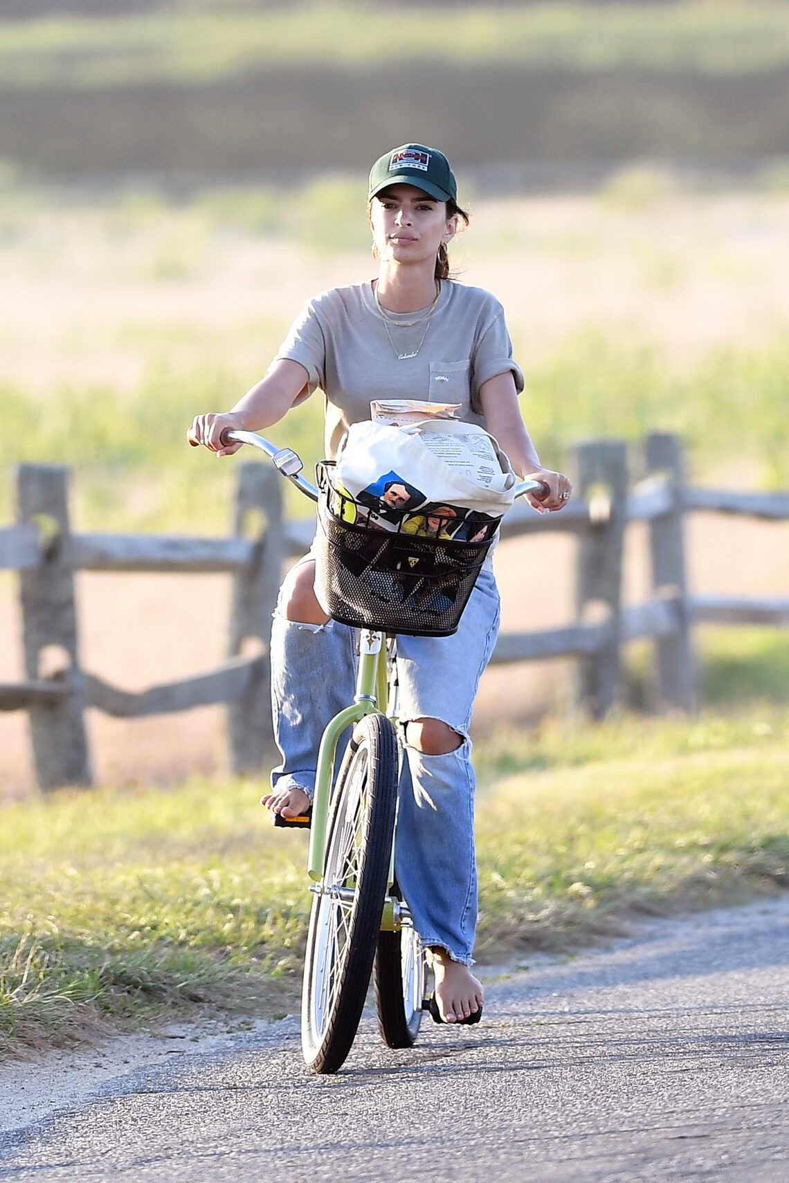 Emily Ratajkowski enjoyed a bike ride in the Hamptons after a day at the beach.