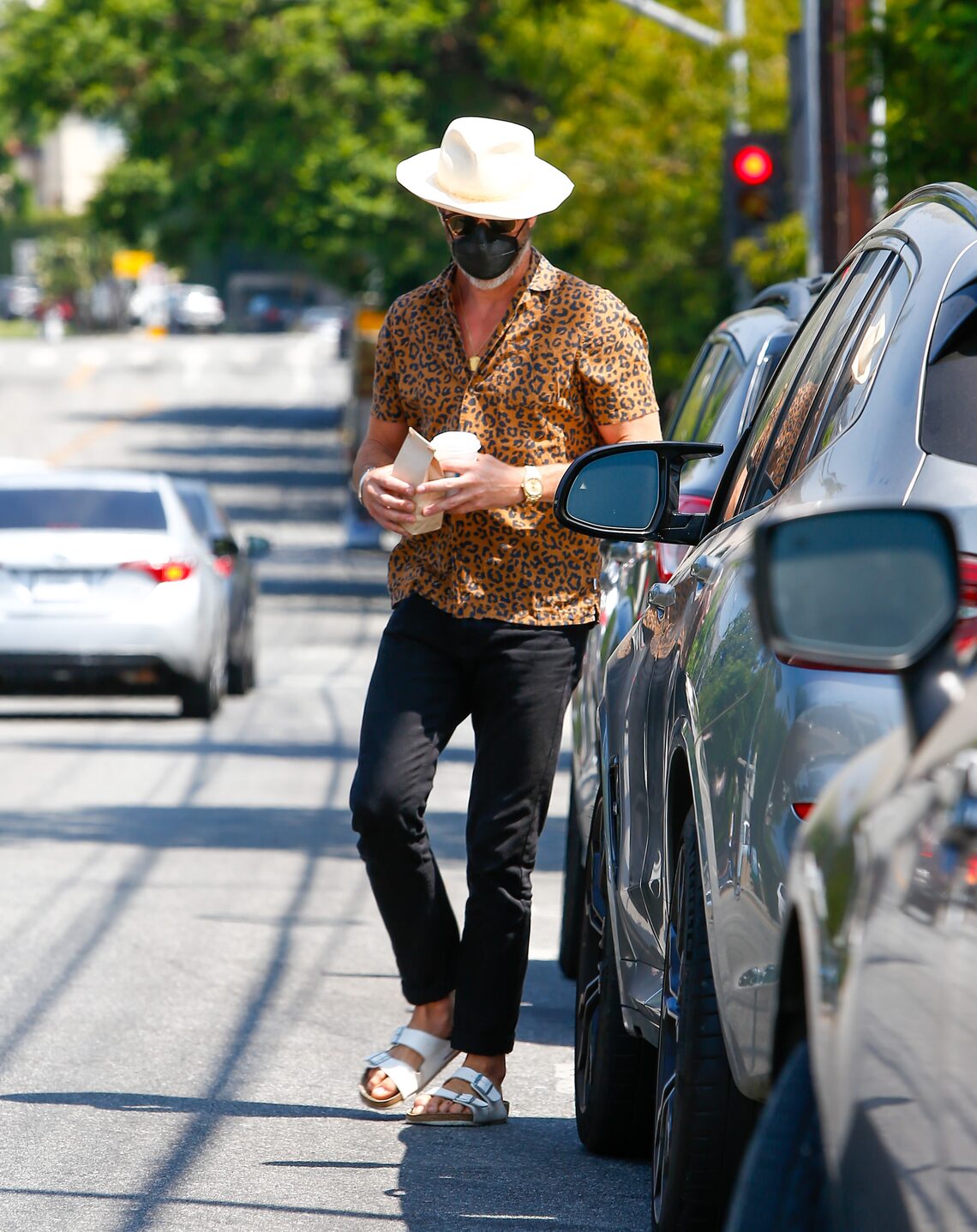 Chris Pine rocked a leopard-print shirt while stepping out in Los Angeles.