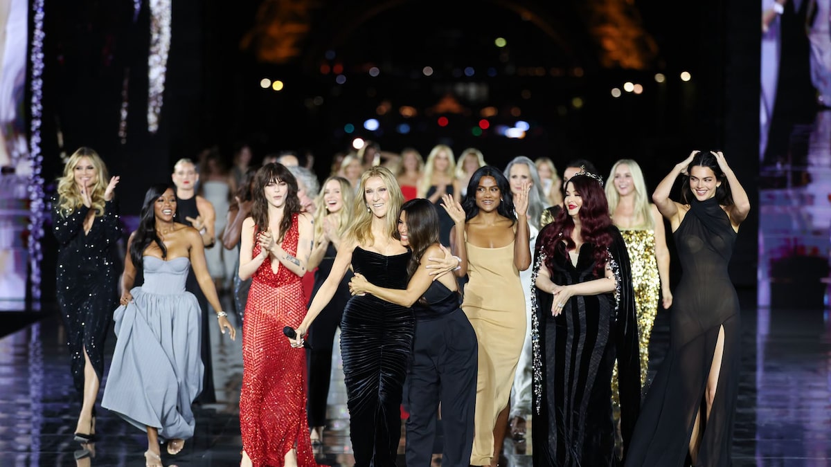 Céline Dion performing on the Paris Fashion Week catwalk