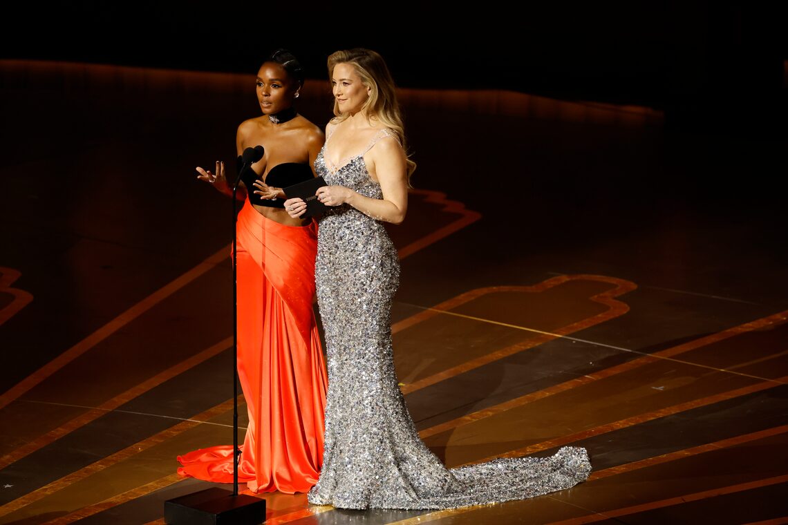 Janelle Monáe and Kate Hudson speak onstage during the 95th Annual Academy Awards.