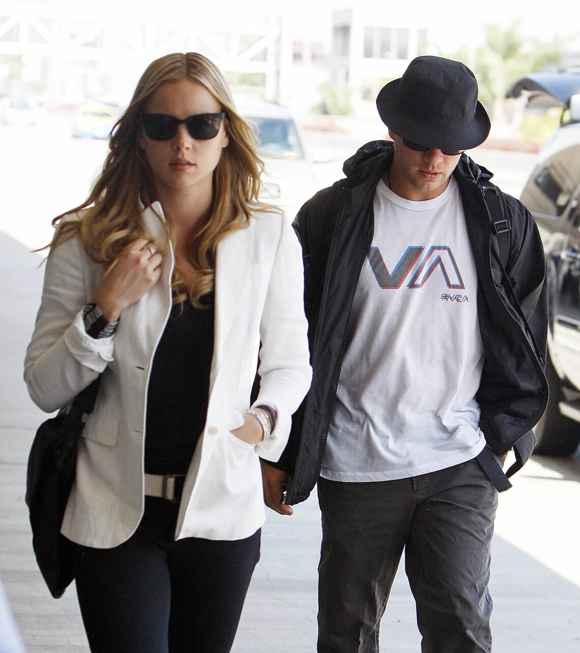 Ryan Phillippe and Aussie girlfriend Abbie Cornish arrive to LAX after a flight -- could the "Stop-Loss" lovers have escaped for a romantic vacay?