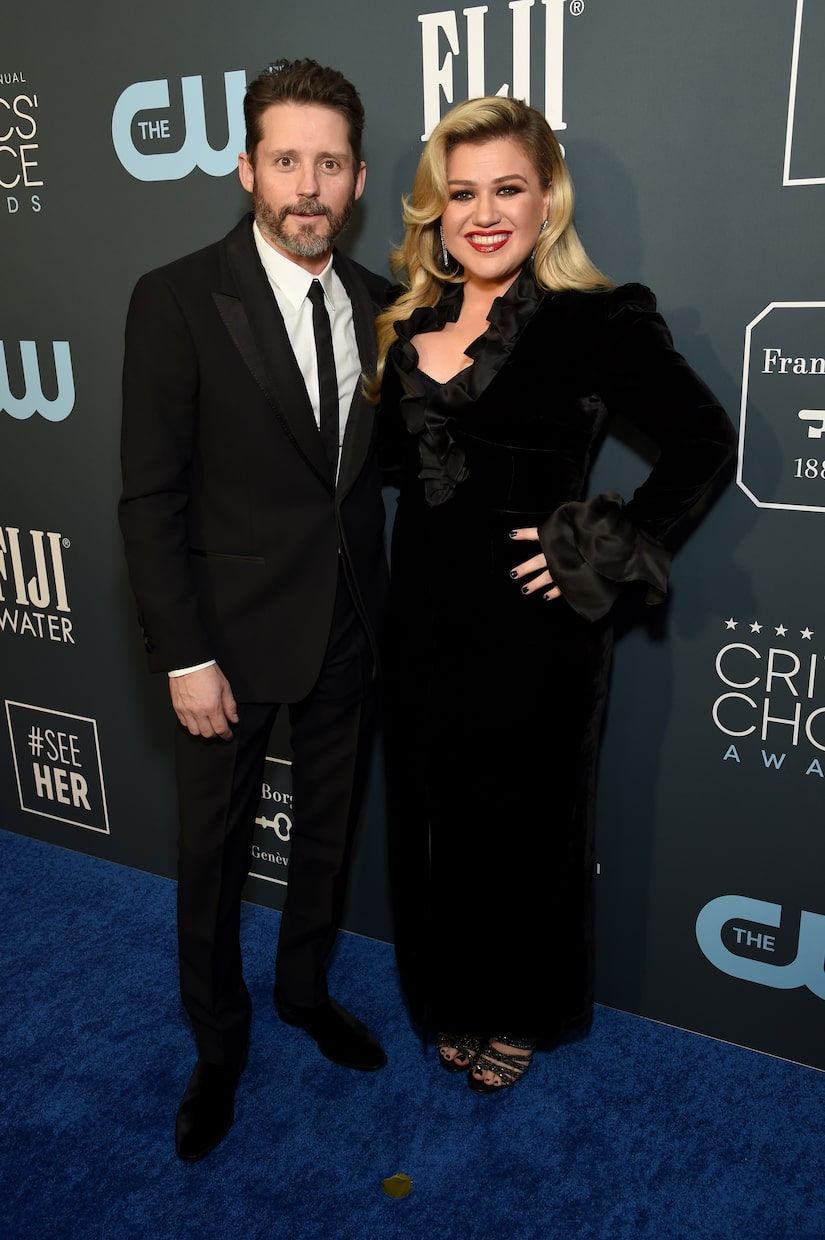 Kelly Clarkson Reveals Ex Brandon Blackstock Is ‘Ill,’ Postpones Las Vegas Residency