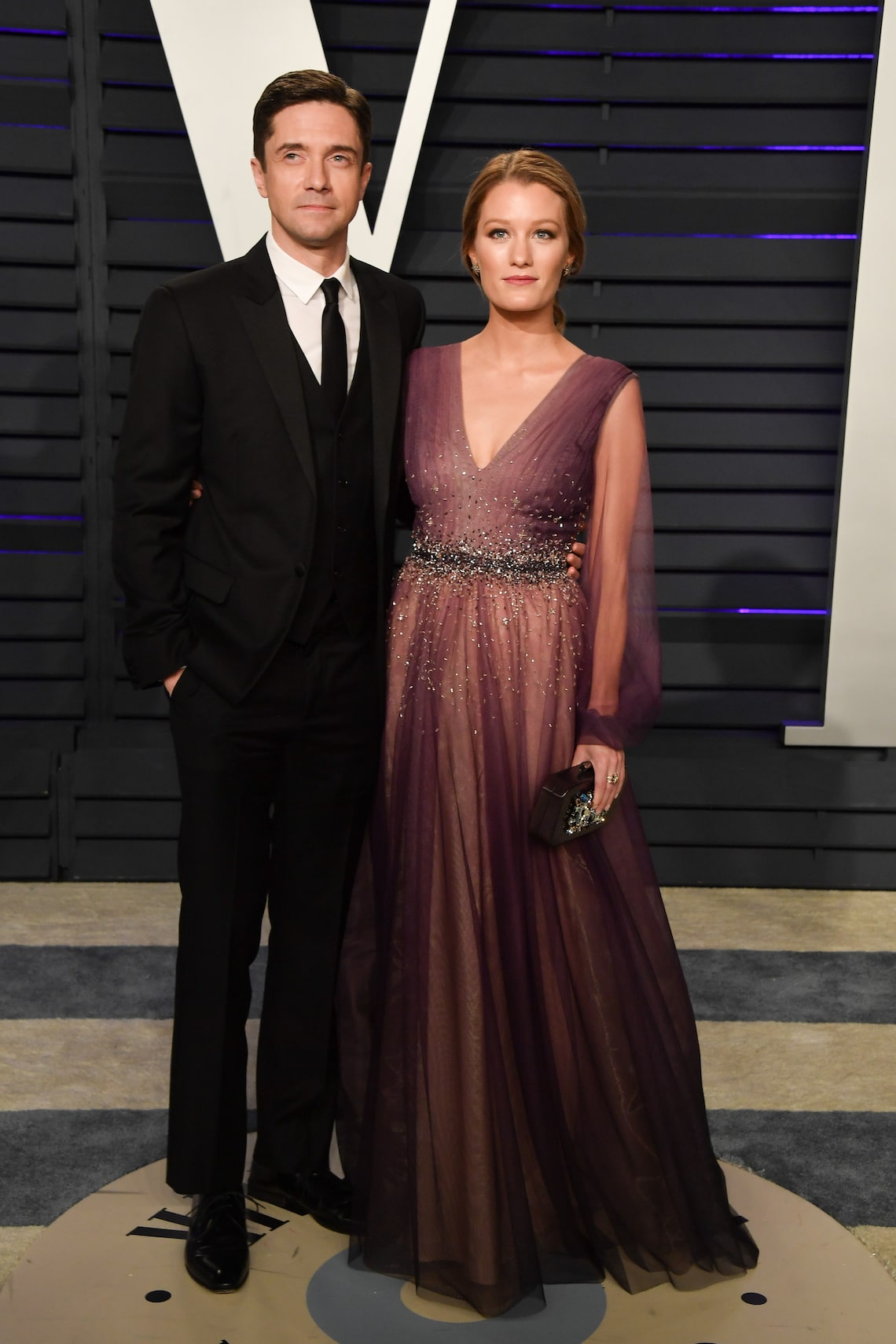 Topher Grace and Ashley Hinshaw attend the 2019 Vanity Fair Oscar Party.