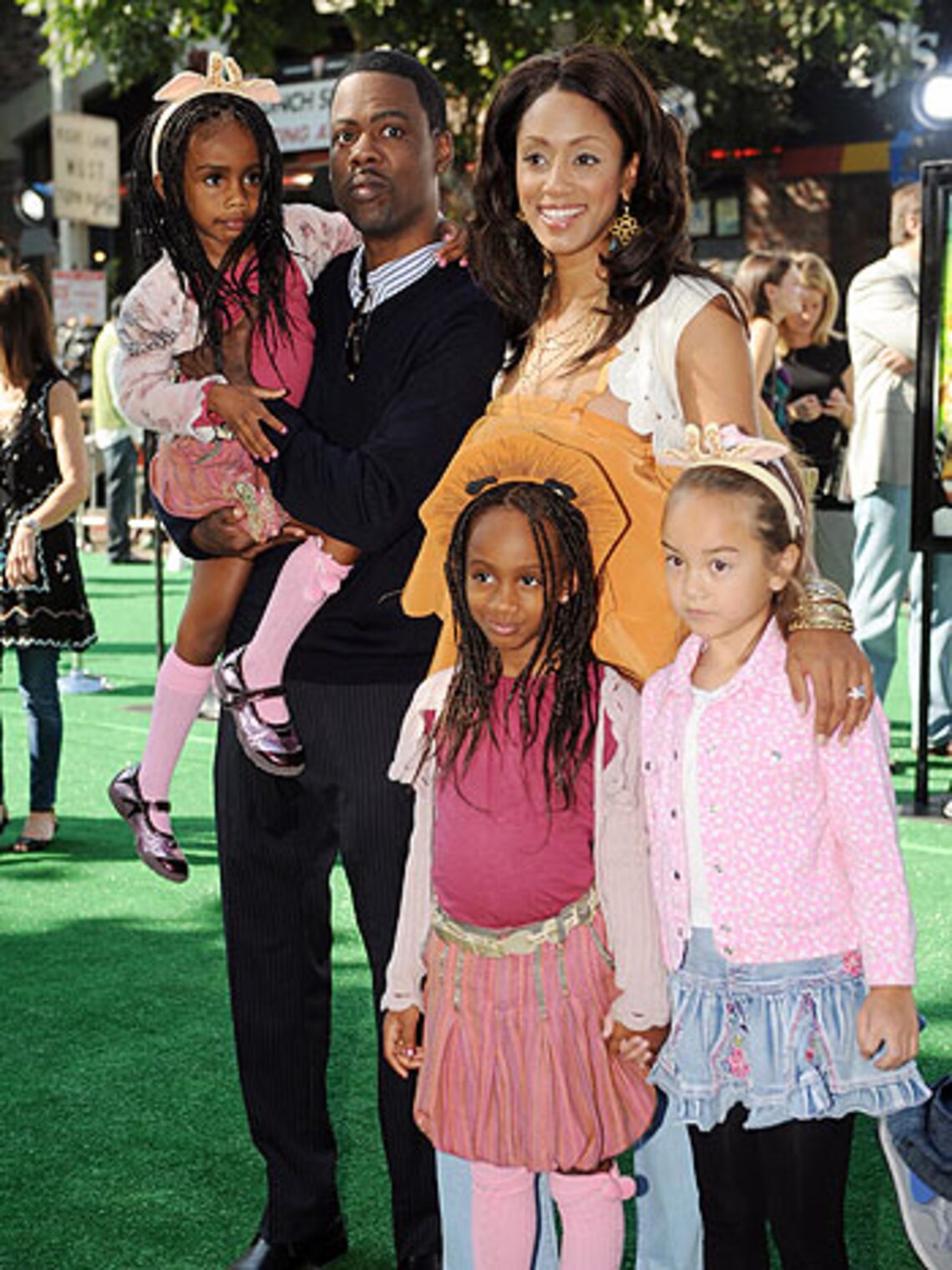 A rather overwhelmed-looking Chris Rock juggles his adorable family at the L.A. premiere of "Madagascar." (Getty Images: Kevin Winter)
