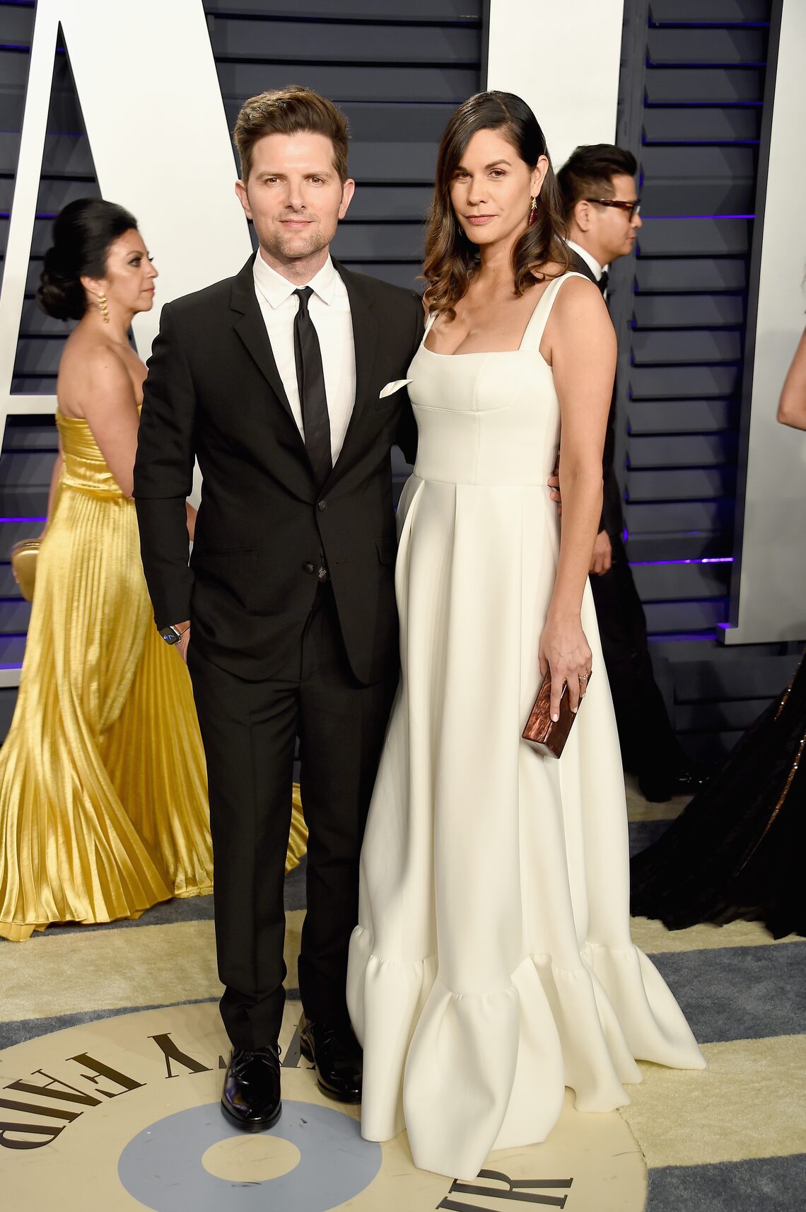 Adam Scott and Naomi Scott attend the 2019 Vanity Fair Oscar Party.