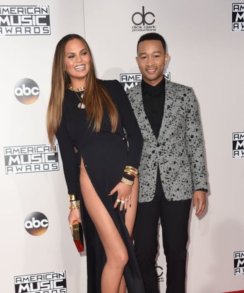 Chrissy Teigen flashes everything as she goes without underwear at