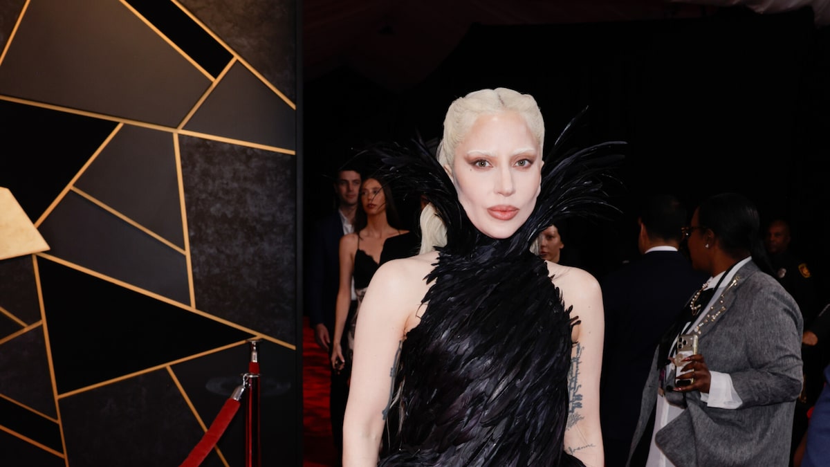 Lady Gaga Brings Mayhem to Grammy Red Carpet in Feathered Gown