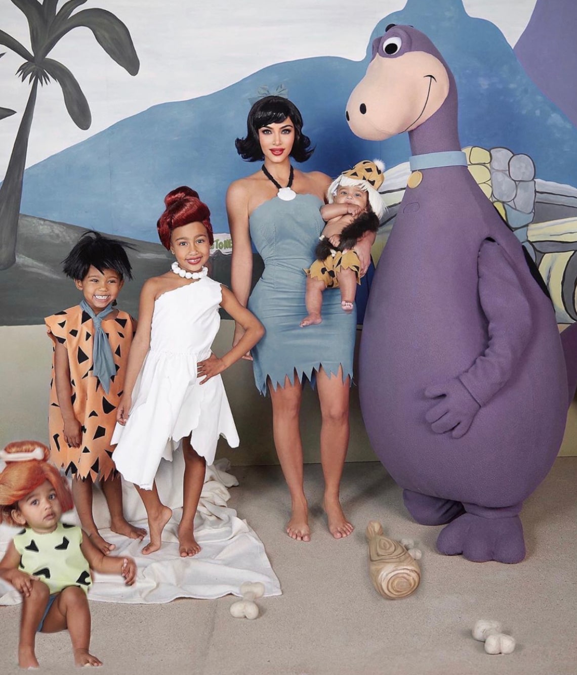 Kim Kardashian and her four kids had a yabba dabba doo time as The Flintstones.